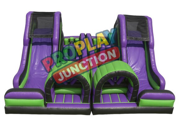 Dual-lane inflatable obstacle course with green and purple slides and arched entrances