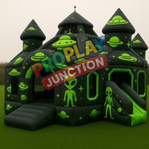 Children’s inflatable bounce house with alien artwork and neon green UFO designs