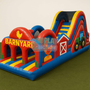 Barnyard inflatable obstacle course with farm-themed arches and a tall slide