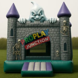 Inflatable bounce castle with ghost character, skeleton decorations, and gothic castle design on green grass